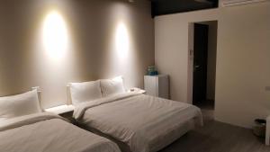 Katil atau katil-katil dalam bilik di 駐駐逢甲 Shine Residence