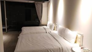 Katil atau katil-katil dalam bilik di 駐駐逢甲 Shine Residence