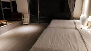 Katil atau katil-katil dalam bilik di 駐駐逢甲 Shine Residence