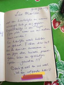 a letter written in handwriting on a notebook at Repelsteeltje op Terschelling in Formerum