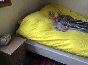 Ein Bett oder Betten in einem Zimmer der Unterkunft Repelsteeltje op Terschelling