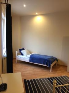 Ένα ή περισσότερα κρεβάτια σε δωμάτιο στο Budapest Airport , accommodation in Vecsés