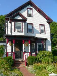 a large white house with red trim at The Morrison House Bed and Breakfast in Somerville
