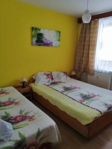 Posteľ alebo postele v izbe v ubytovaní Apartmán Palenica