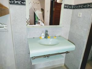 Koupelna v ubytování Mandia Bungalows