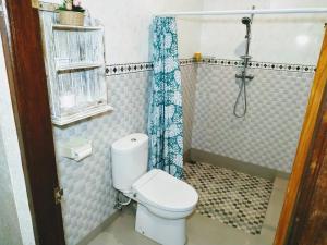Koupelna v ubytování Mandia Bungalows