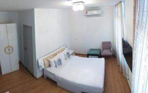 Ein Bett oder Betten in einem Zimmer der Unterkunft Coconut Bay Lodge