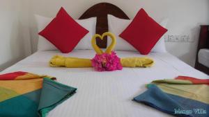 Letto o letti in una camera di Mango Villa Sigiriya
