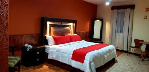 Postel nebo postele na pokoji v ubytování Hotel Murillo Plaza