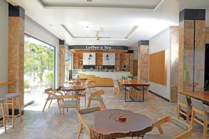 Green Tree Hotel Phú Quốc 레스토랑 또는 맛집