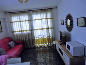 A television and/or entertainment centre at Les Doyes Bl 5 3-73 LEK