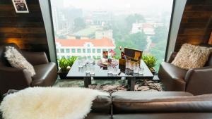 Χώρος καθιστικού στο Authentic Hanoi Boutique Hotel