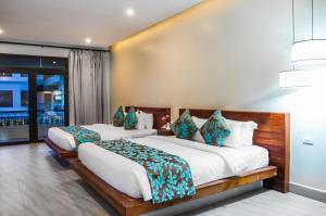 Bayon Modern Residence客房内的一张或多张床位
