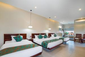 Bayon Modern Residence客房内的一张或多张床位