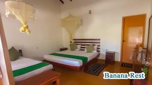 Letto o letti in una camera di Banana Rest Sigiriya