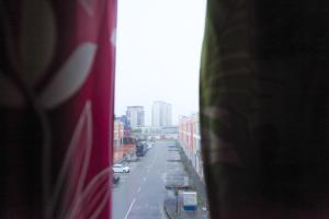 a view of a city street from a window at HOTEL PREMIUM in Ipoh