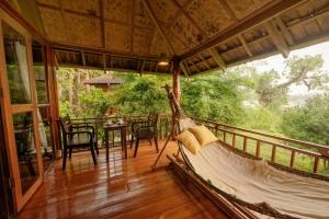 Balkón nebo terasa v ubytování Kingfisher Ecolodge