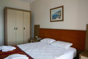 Ein Bett oder Betten in einem Zimmer der Unterkunft Greenport Bodrum Hotel