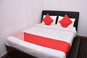 Postel nebo postele na pokoji v ubytování Roshan Guest House
