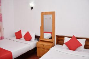 Postel nebo postele na pokoji v ubytování Roshan Guest House