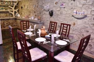 Posezení v ubytování Roshan Guest House