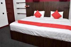Postel nebo postele na pokoji v ubytování Roshan Guest House