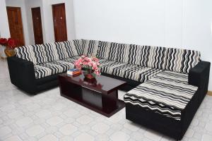 Posezení v ubytování Roshan Guest House