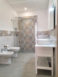 Een badkamer bij Antica Dimora Barocca