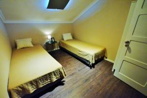 Postel nebo postele na pokoji v ubytování Rooms DP Setúbal