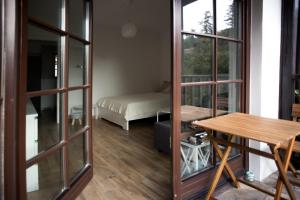 Ένα ή περισσότερα κρεβάτια σε δωμάτιο στο Apartament Kameralny