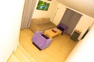Area soggiorno di Scarlet Lodge