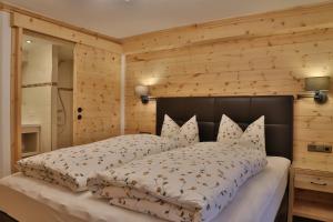 Postel nebo postele na pokoji v ubytování Gästehaus - Apart Braito