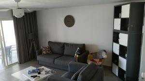 Area soggiorno di Friendly Beach House