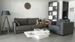 Area soggiorno di Friendly Beach House