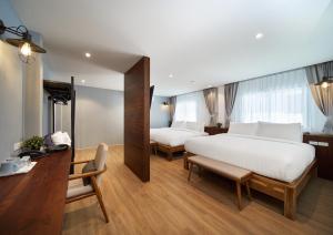 P2 Wood Loft客房内的一张或多张床位