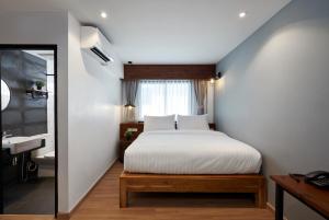 P2 Wood Loft客房内的一张或多张床位