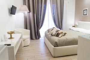Postel nebo postele na pokoji v ubytování Al Parco Verde B&B