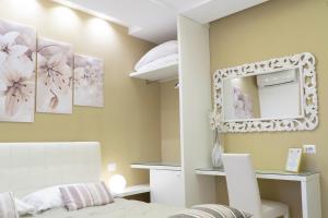 Postel nebo postele na pokoji v ubytování Al Parco Verde B&B