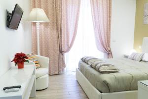 TV a/nebo společenská místnost v ubytování Al Parco Verde B&B