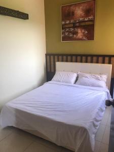 Cama o camas de una habitación en Gold coast Morib apartment