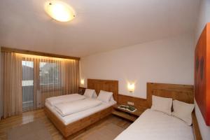 Posteľ alebo postele v izbe v ubytovaní Appartement Lackner