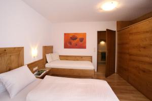 Posteľ alebo postele v izbe v ubytovaní Appartement Lackner