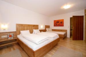 Posteľ alebo postele v izbe v ubytovaní Appartement Lackner