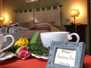 Posteľ alebo postele v izbe v ubytovaní La Cantina Relais - Fattoria Il Cipresso