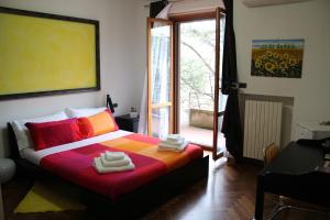 Katil atau katil-katil dalam bilik di B&B Nature Colors