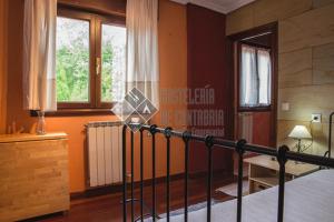 A bed or beds in a room at Hostal casa lucas