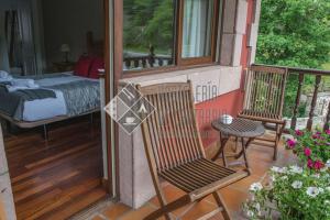 A balcony or terrace at Hostal casa lucas Még 12 kép