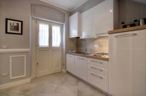 Virtuvė arba virtuvėlė apgyvendinimo įstaigoje Giotto suite