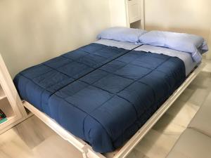 Ένα ή περισσότερα κρεβάτια σε δωμάτιο στο MI CAPRICHO B17 Beachfront Apartment +45 φωτογραφίες