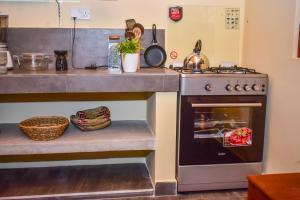 Η κουζίνα ή μικρή κουζίνα στο Onera Villa